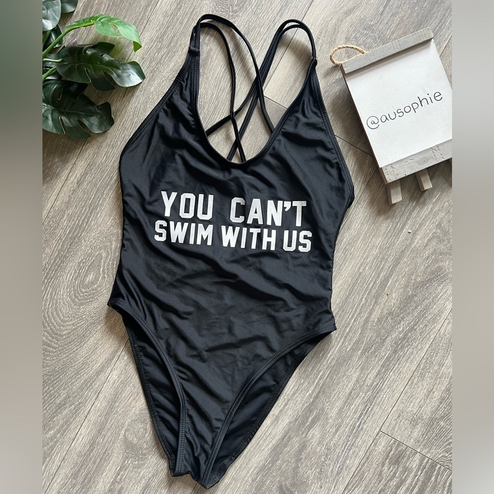 “You can’t swim with us” strappy one piece. Size M
